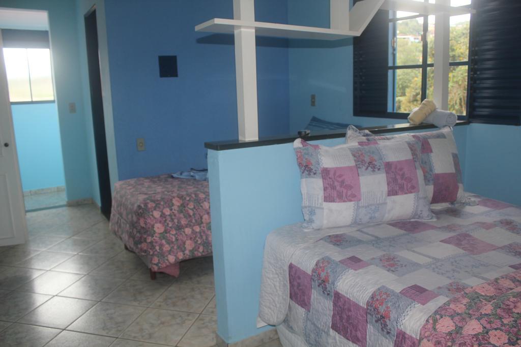 Quarto Quádruplo com Vista da Montanha